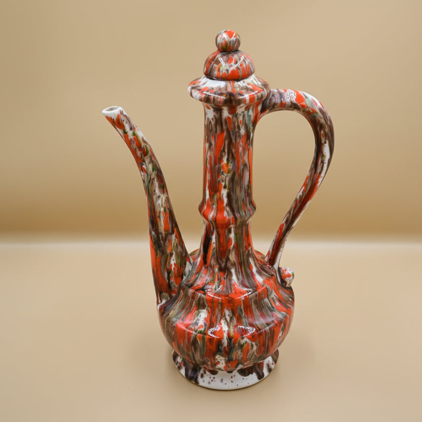 Studio Art Teapot featuring a brown and orange drip glaze