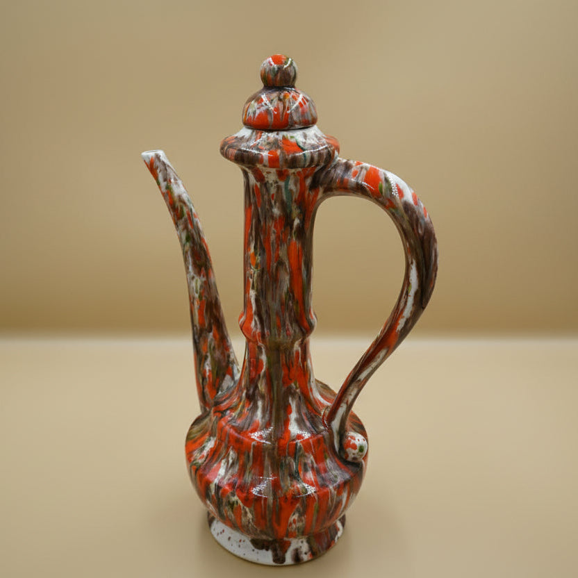 Studio Art Teapot featuring a brown and orange drip glaze